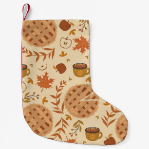 Nahtlos mit Apfelkuchen, Äpfeln und Tasse.  Kleiner Weihnachtsstrumpf