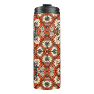 Nahtlose Ziermuster mit Blumen und Paiseln Thermosbecher