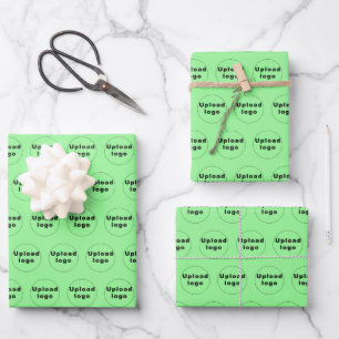 Nahtloses Muster des Firmenlogos auf hellgrün Geschenkpapier Set