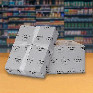 Nahtloses Muster-Logo für das Geschäft Grau-Wrappi Geschenkpapier
