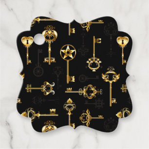 Nahtloses Muster mit Golden Keys Geschenkanhänger