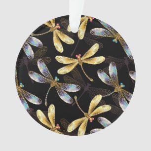 Nahtloses Muster mit goldenen Libellen Ornament