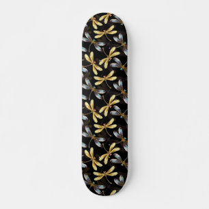 Nahtloses Muster mit goldenen Libellen Skateboard