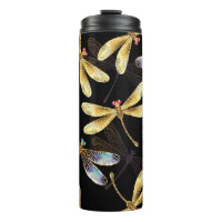 Nahtloses Muster mit goldenen Libellen