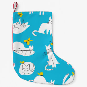Nahtloses Muster mit lustigen Katzen, die mit Hint Kleiner Weihnachtsstrumpf