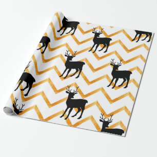 Nahtloses Muster mit schwarzem Hirsch und goldener Geschenkpapier