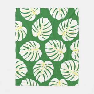 Nahtloses Muster weißer Monstera-Blätter auf einem Fleecedecke