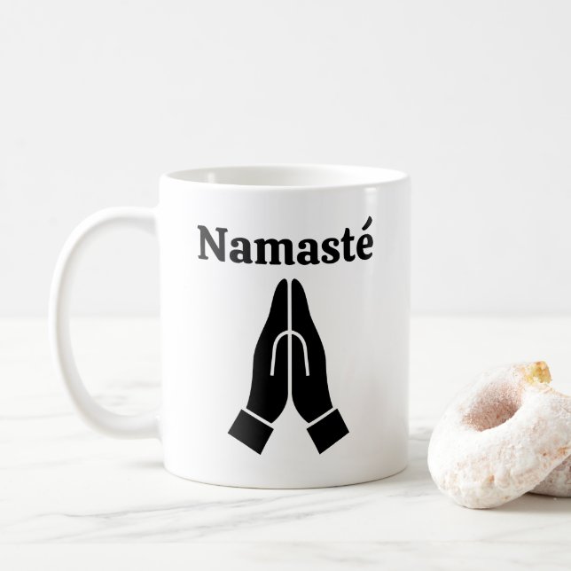 Namasté begrüßt die Tasse des Kaffeesymbols (Mit Donut)