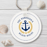 Name Beach House Anchor Gold Laurel Star Schlüsselanhänger<br><div class="desc">Ein stilvoller Schlüsselanhänger im nautischen Stil mit Ihrem personalisierten Familiennamen und Strandhaus, Seehaus oder anderen Wunschtexten und festem Datum. Ein speziell entworfener Bootanker mit goldfarbenen Lorbeertönen und einem weißen Stern oder passen die Basisfarbe leicht an Ihre aktuelle Dekoration oder Ihr aktuelles Thema an. Ideal für die Betonung der Schlüssel für...</div>