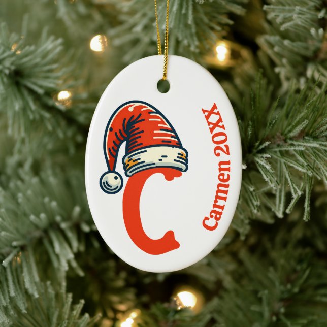 Name und Weihnachtsmannmütze des personalisierten  Keramik Ornament (Baum)