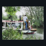 NARROWBOATS PUZZLE<br><div class="desc">Ein Kunstdesign eines Mannes, der sein enges Boot entlang des Kanals lenkt. Die im Vereinigten Königreich als Schmalboote bekannten Kanalboote wurden ursprünglich zur Beförderung von Gütern im ganzen Land eingesetzt. Sie werden heute hauptsächlich zur Freizeitgestaltung genutzt und ziehen Menschen aus aller Welt an, um unsere ländliche Umgebung zu genießen. Diese...</div>