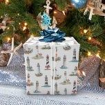 Nautic Christmas Lighthouses White Geschenkpapier<br><div class="desc">Dieses wunderschöne Weihnachtsmuster aus dem Wassersport besticht durch eine Vielzahl von Leuchttürmen,  die für die Ferien auf weißem Hintergrund dekoriert wurden. Bitte Karo aus der Kollektion für passende Produkte. Wenn Sie mehr passende Produkte oder andere Farbwege wünschen,  kontaktieren Sie mich bitte über Zazzle Chat.</div>