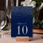Navy Blue & Glam Silver Confetti Wedding Tischnummer<br><div class="desc">Die Hochzeitskollektion aus Marineblau und Glassilber Konfetti ist perfekt für alle Paare, die eine romantische Hochzeitsfeier planen. Das Design besticht durch einen schicken marineblau-blauen Hintergrund mit glam silbernen Konfetti, der wirklich atemberaubend und perfekt für jede besondere Veranstaltung geeignet ist. Die Formulierung enthält die gleiche silberne Farbe des Designs und kann...</div>