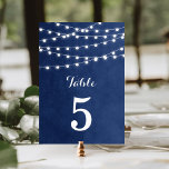 Navy Blue String Lights Hochzeiten Tischnummern<br><div class="desc">Moderne Hochzeitskartentechnik mit schlichter Tischnummer, schlichter, glänzender Saitenleuchte, die über das Oberteil hängt, und einer eleganten Mischung aus modernen und kalligraphischen Schriftart auf einem Aquarellhintergrund aus gedruckten Imitaten. Ein schlichtes und stilvolles Design, perfekt für den Sommer! Klicken Sie auf die Schaltfläche IT CUSTOMIZE, um Schriftart anzupassen, Text zu verschieben und...</div>