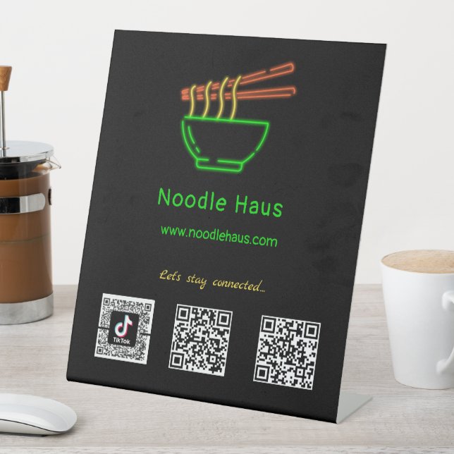 Neon Asian Noodle Bowl Social Media Scan Codes Sockelschild (In Situ)