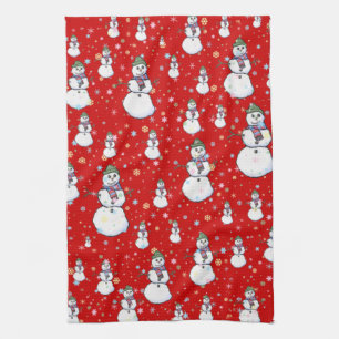 Netter niedlicher Snowman und Küchentuch