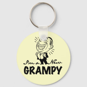 Neue graue T - Shirt und Geschenke lächeln Schlüsselanhänger