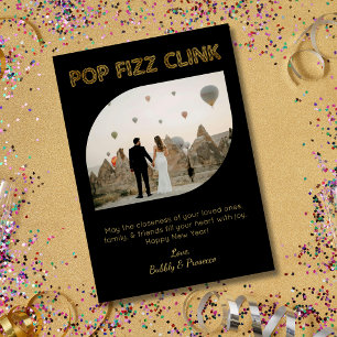 Neuer Pop Fizz Clink Typografie glücklich Neues Ja Feiertagskarte