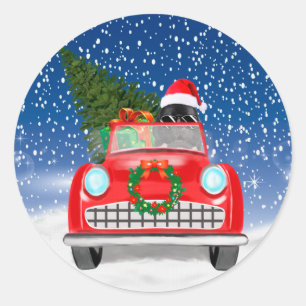 Neufundländer fährt Auto im Schnee Weihnachten Runder Aufkleber