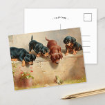 Neugierige Dackel Welpen | Carl Reichert Postkarte<br><div class="desc">Neugierige Dackel Welpen und Frosch | Carl Reichert’s charmantes Bild Curious Dackel Welpen und ein Frosch fängt einen spielerischen Moment ein, in dem sich vier bezaubernde Welpen der Dackel neugierig um einen kleinen Frosch versammeln. Die detaillierte Darstellung der ausdrucksvollen Welpen und der lebendigen Haltung, gepaart mit der ruhigen natürlichen Umgebung,...</div>