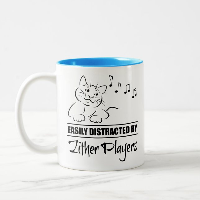 Neugierige Katze von Zither-Spielern leicht abgele Zweifarbige Tasse (Links)