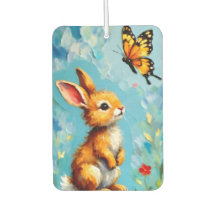 Neugieriges Kaninchen und Schmetterling