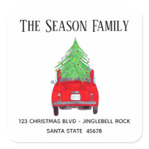 New Address Red Car mit Weihnachtsbaum