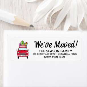 New Address Red Car mit Weihnachtsgeschenken