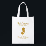New Jersey Staat Map Wedding Welcome Bag, Gold Tot Wiederverwendbare Einkaufstasche<br><div class="desc">Hochzeitswochenende Begrüßungsgeschenk-Tasche für Gäste aus der Stadt zu Ihrer Hochzeit,  mit Bild von New Jersey,  mit Herz können Sie an der genauen Lage platzieren. Füllen Sie Tasche mit Ihren Lieblingsgoodies.</div>