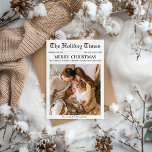 Newsletter der Zeitung Weihnachten 1 Foto Einzigar<br><div class="desc">Die Weihnachtskarte der Zeitung Holiday Times ist eine wunderbare und einzigartige Möglichkeit, die festliche Jahreszeit zu feiern und dabei über die wertvollsten Momente Ihrer Familie aus dem vergangenen Jahr nachzudenken. Inspiriert durch den nostalgischen Charme einer Vintagen Zeitung, ist diese Karte perfekt für Familien, die die Highlights des Jahres in einem...</div>