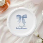 Niedlich Blue Bow Ribbon Baby Boy Dusche Pappteller<br><div class="desc">Mit diesen Niedlichen Blue Bow Ribbon Baby Boy Shower Paper Tellern servieren Sie stilvolle Leckereien! Diese charmanten Teller, die auf ein klassisches Babyduschthema abgestimmt sind, zeichnen sich durch ein bezauberndes blaues Bugband-Design auf sanftem pastellfarbenem Hintergrund aus. Diese Teller sind perfekt geeignet, um dem Tisch eine süße und raffinierte Touch zu...</div>