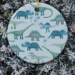 Niedlich Blue Dinosaurier Keramik Ornament<br><div class="desc">Viele blaue Dinosaurier,  Tyrannosaurus rex,  Spinosaurus,  Stegosaurus,  Diplodocus und Triceratops auf blauem Hintergrund. Ideal für Paläontologen. Originelle Kunst von Nic Squirrell.</div>
