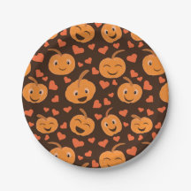 Niedlich lächelnde Kürbismuster mit Herzen