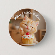Niedlich Orange Kitten mit einem Cupcake