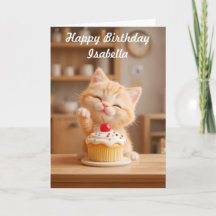 Niedlich Orange Kitten mit einem Cupcake