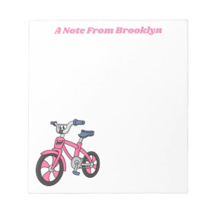 Niedlich-pink-Kinder Fahrrad Cartoon Abbildung Notizblock