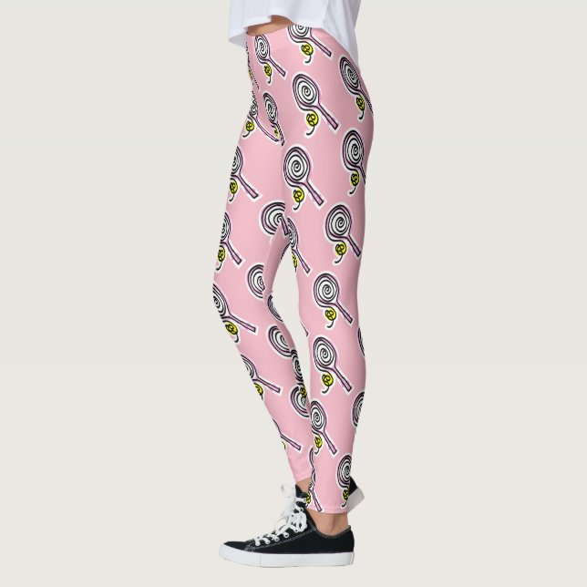 Niedlich-pinkfarbene Tennisschläger und Ball-Muste Leggings (Links)