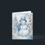 Niedlich Snowman Blue Hat Scarf Trees Birdhouse Bl Karte<br><div class="desc">Schneemann in blauer Hut und Schal umgeben von hübschen weißen Blume,  schneebedeckten Bäumen und einem Vogelhaus an diesem kalten Wintertag.</div>