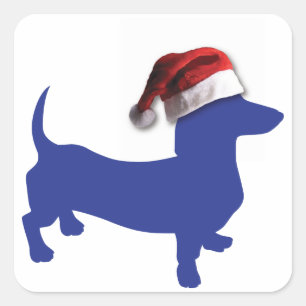 Niedliche Dackel in einer Weihnachtsmannmütze Quadratischer Aufkleber
