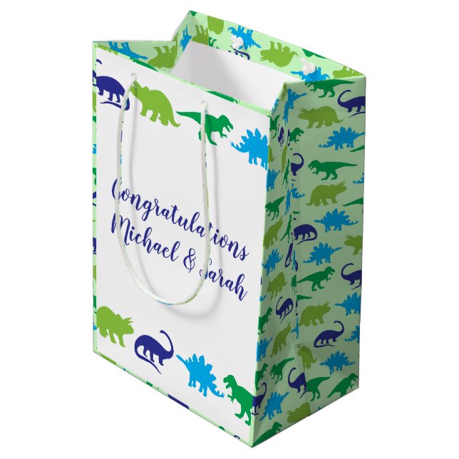 Niedliche Dinosaur Baby Dusche Dino Blue und Green Mittlere Geschenktüte (Rückseite Schrägansicht)