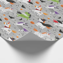 Niedliche Einhörner in Halloween-Kostümen