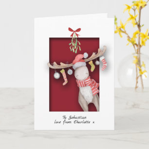 Niedliche Elche mit Mistletoweihnachtsfest Karte