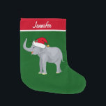 Niedliche Elefantenindividuell Großer Weihnachtsstrumpf<br><div class="desc">Dieser wunderschöne Weihnachtselefant-Strumpf besticht durch einen niedlich lächelnden Elefanten,  der eine rote Weihnachtsmannmütze mit einem erhabenen Stamm trägt. Dieser hübsche personalisierte Strumpf ist mit einem schönen grünen Hintergrund dekoriert. Personalisieren Sie mit Ihrem eigenen Text am Ende für ein klassisches Geschenk.</div>
