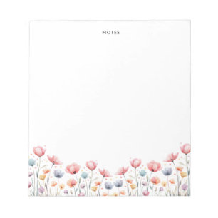 Niedliche, farbenfrohe Springbrust bläst blass Notizblock