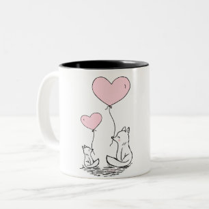 Niedliche Füchse mit rosa Herzblasen Zweifarbige Tasse
