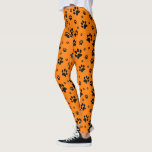 Niedliche Fun Black auf hellen Orange Paw Prints Leggings<br><div class="desc">Diese lustigen Leggings sind perfekt für Hunde- und Katzenliebhaber. Sie zeichnen sich durch ein niedliches Muster aus,  dessen schwarze Pfoten auf einem hellen,  orangefarbenen Hintergrund verstreut sind. Fun whimsical Design ist perfekt für Haustier-Eltern und Tierfreunde.</div>