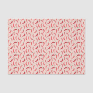 Niedliche Gemusterte Chile-Paprikaschoten auf rosa Seidenpapier
