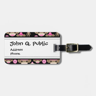 Niedliche Girly rosa Socke Monkeys Mädchen auf Gepäckanhänger