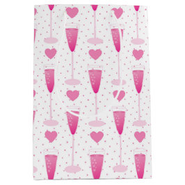 NIEDLICHE GLAS AUS PINKCHAMPAGNE UND HERZEN MITTLERE GESCHENKTÜTE