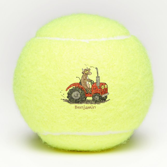 Niedliche glückliche Kuh, die einen roten Traktor- Tennisbälle (Vorderseite)